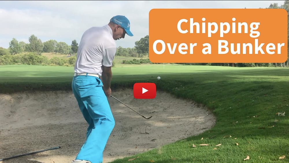 Downhill Chip over a bunker.